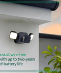 Outdoor 4 Floodlight Camera with Wireless Security 700 Lumen Smart Lighting mounted on wall with two year battery life