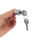 Hand holding Heavy Duty Gumball Machine Lock And Key Set With One Quarter Twenty Tubular Cylinder Replacement Metal Top Cover Parts