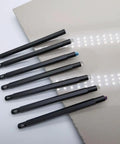 Solid Seven Piece Mohs Hardness Scratch Test Pens For Gemstone Checking Mineral ID displayed on a light surface.