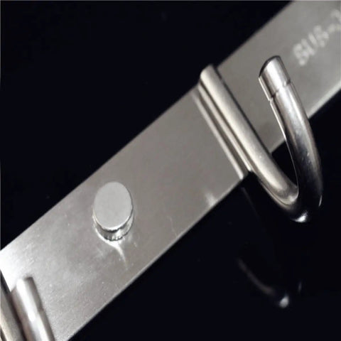 Close-up of heavy duty stainless steel wall mount hook showing attachment point for the heavy duty stainless steel wall mount hooks low profile hidden storage setup hella durable rust resistant key and coat rack three pack for bathroom organization.
