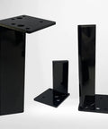 Tough As Nails 4 Pack Stainless Steel Furniture Legs Rock Solid Table Risers For TV Stand Ottoman Cabinet DIY Replacement Metal Feet With Rubber Pads 60 Cm 23.6 Inch black risers in various heights with mounting plates.