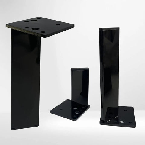 Tough As Nails 4 Pack Stainless Steel Furniture Legs Rock Solid Table Risers For TV Stand Ottoman Cabinet DIY Replacement Metal Feet With Rubber Pads 60 Cm 23.6 Inch black risers in various heights with mounting plates.