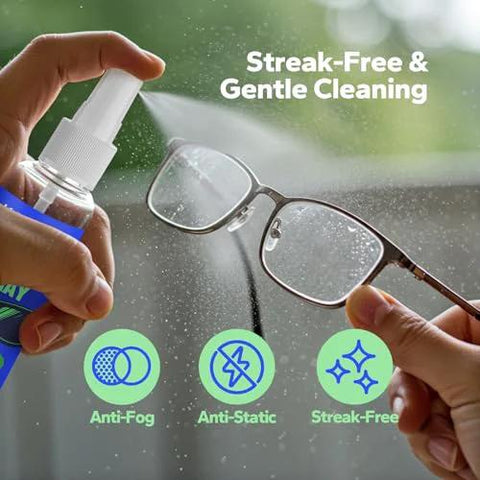 Kototo eyeglass cleaner spray, front view bottle cleaning eyeglass lenses; anti-fog, anti-static, streak-free icons visible