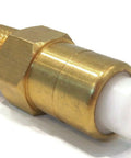Thermal relief valve for pressure washer, brass body with white plastic actuator, close-up.