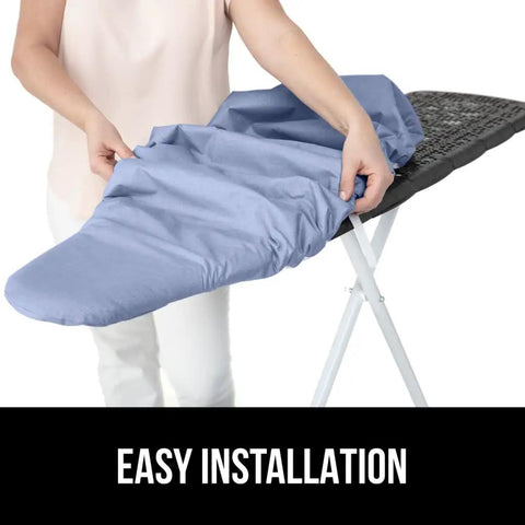 Person installing Heavy Duty Ironing Board Cover With Extra Thick Padding Silicone Reflective Surface Heat And Scorch Resistant on board