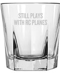 Plane Nerd Gift Rocks Glass For RC Aircraft Fans Whiskey Tumbler For The Pilot Who Still Plays With RC Planes Radio Controlled Aircraft Buff Dope Gift For Aircraft Enthusiasts, clear glass with text 'Still Plays With RC Planes'