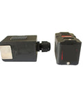 Heavy Duty Ultrasonic Clamp On Sensor For Flow Meters, black transducer with plug and play design for fluid tracking.
