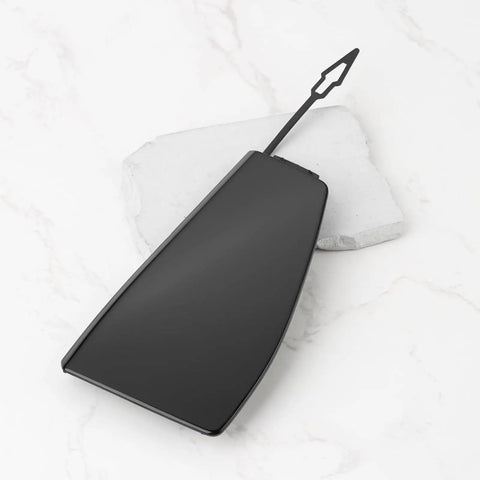 Front Right Tow Hook Cover For BMW G05 X5 M Sport And M50i 2019-2022 Direct OEM-Style Replacement angled on marble texture