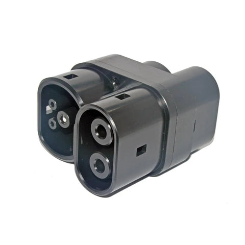 Heavy Duty Ccs1 To Ccs2 Fast Charge Adapter Backed By Dc And Ac Power For Type One To Type Two Ev Converters Rated At Two Hundred Fifty Amps close-up of black adapter plugs.