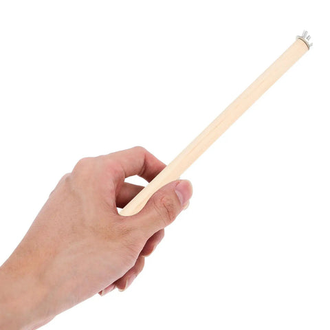 Hand holding a smooth natural wood perch from the Premium Natural Wood Bird Perch Stand Set For Parakeets And Cockatiels.
