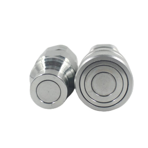 Front view of two chrome ISO16028 skid-steer flat-face hydraulic quick-connect couplers, 3/4 NPT, with dust caps