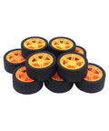10 Piece Model Car Wheel Set With Rubber Tires And Five Round Shaft Axles in bright yellow, close-up view.