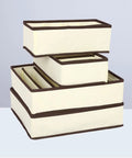 Four Piece Plastic Drawer Organizers With Six Seven Eight Compartments In Warm Beige for organized top shelf closet sorting.