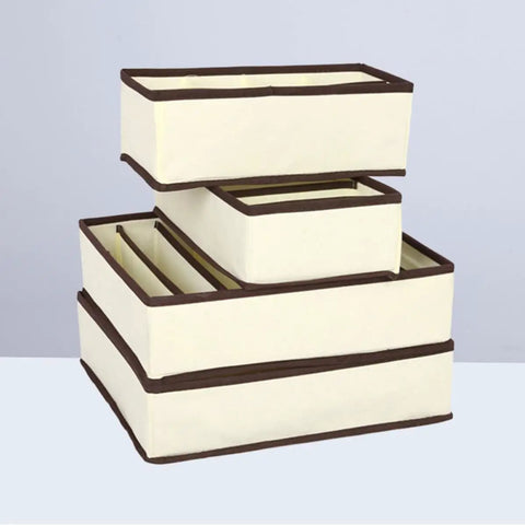 Four Piece Plastic Drawer Organizers With Six Seven Eight Compartments In Warm Beige for organized top shelf closet sorting.