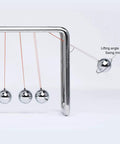 7 Ball Newton's Cradle Pendulum Desk Toy With Classic Swing And 30 Plus Second Swing Time, Chrome Iron Construction side view