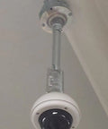 Installed round swivel fixture hanger cover for electrical boxes fits 1/2 inch and 3/4 inch threaded nipples with camera mounted