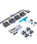 Straight Up Heavy Duty Machine Vise With Six Inch Jaw Width, Fifty Millimeter Clamp Height, And Two Hundred Millimeter Max Opening set of accessories including blocks and tools.