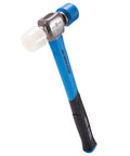 Double Face Rubber Mallet 12 Oz With White Nylon Head And Blue Soft Face, Graphite Core Handle, displayed diagonally.