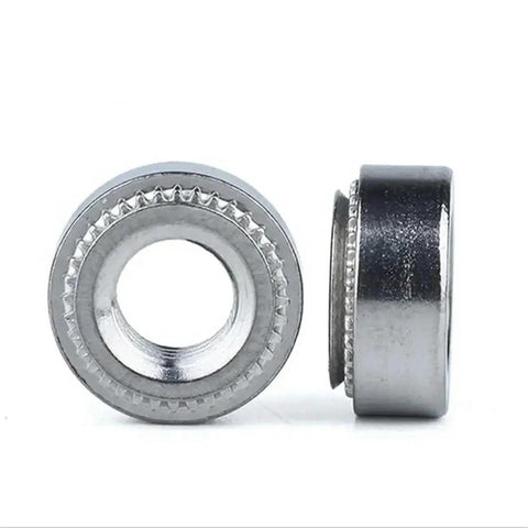 Top Shelf M3 Self Clinching Nuts With A Ridiculously Secure Serrated Flange For Server Rack Hardware And Heavy Equipment Assemblies That Crush Out Vibrations Quick Press Fit Threaded Inserts 100 Pack, showing serrated rim design.