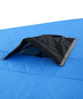 Kick Back In This Pop Up Ice Fishing Tent For Three To Five Crew showing insulated roof panel access for winter camp gear.