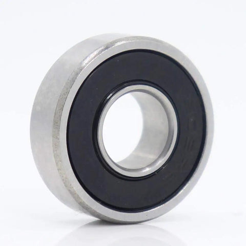Top Rated 608 Hybrid Ceramic Ball Bearings for Skateboards And Scooters Featuring Si3N4 Balls For Smoother Spins With Low Friction And High Durability Perfect For Fast Motors And Industry Spindles At 9x22x7mm Size - Close-up of a sealed ceramic bearing.