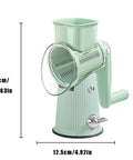 Front view of a green 5-in-1 hand-crank kitchen chopper with feed chute and rotating drum for slicing and grating.