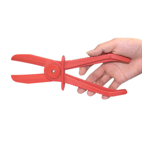 Top Notch 3 Pc Oil Pipe Clamp Tool Kit For Car Enthusiasts Line Pinchers And Sealers Perfect For Fixing Leaks Crushing Fuel Lines And Sealing Oil Pipes Like A Boss Without Breaking The Bank Today red plastic clamp held in hand