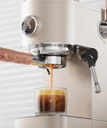 Slick Dual Boiler Semi Automatic Espresso Machine With Built In Grinder And Cold Brew Function 20 Bar Pressure 2100 Watt Motor brewing espresso.