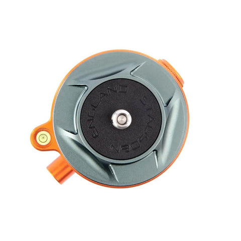 Precision Camera Leveling Base Featuring Smooth Rotating Bubble Level With One Quarter Twenty Screw Thread And Slide Sleeve Adapter top view showcasing metallic slate gray and orange accents.