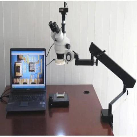 Professional Trinocular Stereo Zoom Microscope With Long Working Distance For Precision Inspection Of Circuits And Dental Appliances Includes 10x Wide Field Eyepieces For Clear Comfortable Viewing on clamping arm stand with laptop display