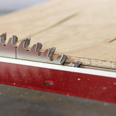 Close-up of the 10 Inch Ultra Smooth Crosscut Saw Blade With 80 Teeth, cutting wood cleanly, showing nickel armor coating and kerf precision.
