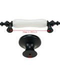 8 Pack Ceramic Drawer Pulls And Knobs Set In Black And White For Kitchen Cabinets And Wardrobes Includes Four Three Hole Centered Handles And Four Single Hole Knobs 126mm Long Handles 76mm Hole Centers Durable Zinc Alloy And Ceramic Construction, showing close-up of white ceramic handle and black knob.