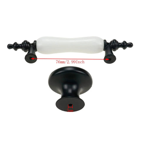 8 Pack Ceramic Drawer Pulls And Knobs Set In Black And White For Kitchen Cabinets And Wardrobes Includes Four Three Hole Centered Handles And Four Single Hole Knobs 126mm Long Handles 76mm Hole Centers Durable Zinc Alloy And Ceramic Construction, showing close-up of white ceramic handle and black knob.