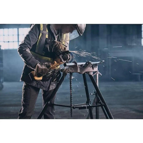 Worker using angle grinder with MetalMax 4 1/2 Inch Segmented Rim Diamond Cutting Wheel For Metal 7/8 Inch Arbor 13,200 Max RPM