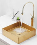 Square Stainless Steel Vessel Sink T304 Bathroom Wash Basin Counter Mount With Pop Up Drain Brushed Nano Finish in gold with water flowing