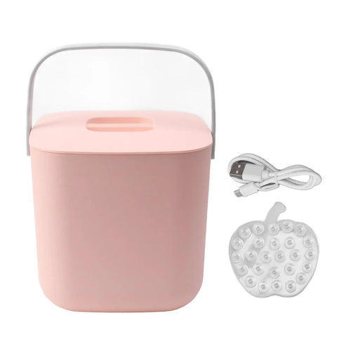 Compact pink container with transparent handle, USB cable, and silicone apple-shaped mat for tiny kitchens and dorms.