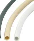 Three drip irrigation tubes in green, sand, and white colors, highlighting the 1/4 inch sand colored tube for flexible use.