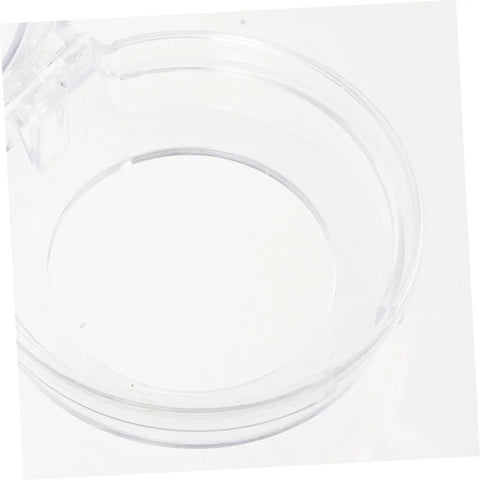 Top view of a transparent knob cover from Six Pack Stove Knob Covers Transparent Safety Guards For Gas Electric And Induction Stoves And Washing Machines Easy To Install Button Protectors For Kid Safe Home No Fuss Family