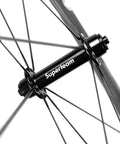 Close-up of Superteam hub on Carbon Wheelset 45to50CU-25-CC 700C Tubeless Rim Brake For Road Bikes, Ultra Lightweight Yet Strong.