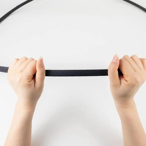 Solid Rubber Lawnmower Drive Belt For 48 Inch Decks, Durable Replacement Compatible With Husqvarna 48 Inch Deck Mowers And Craftsman AYP 48 Inch Decks, Fits Models 2348LS, 2748GLS, GTH 2448T, YTH 2448T, YTH 24K48, PBGT22, PB24, shown stretched by hands