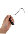 Hand holding a Tent Stake Puller Tool For Camping Peg Remover And Extractor, Lightweight Portable Design For Quick Setup.