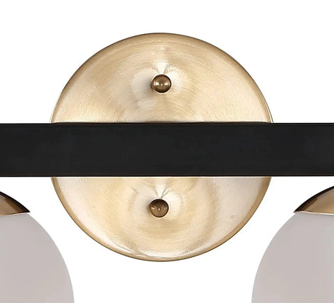 Close-up of 24 Inch Brass Gold And Black Dope Modern Globe LED Vanity Wall Sconce Light With White Frosted Glass Shade, Art Deco style