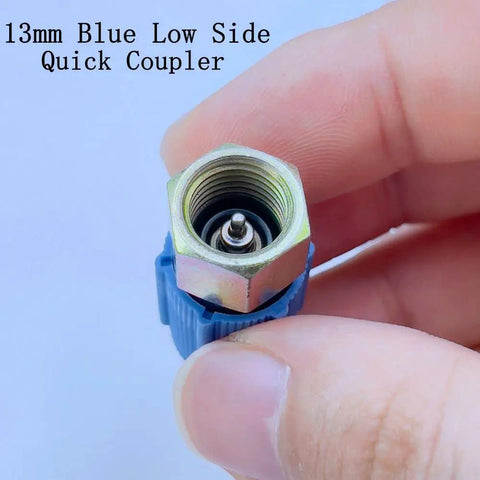 13mm Blue Low Side Quick Coupler for R12 To R134A AC Retrofit Fitting Adapter Kit shown in hand for size reference.
