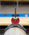MPCH250 magnetic pipe centering head with red dial and anodized aluminum body mounted on a metal pipe