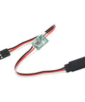 Servo delay module for models; front view shows green PCB with red, white and black wires and black connectors.