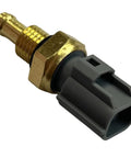 Coolant temperature sensor with brass threaded body and gray plastic electrical connector (close-up)