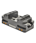 Heavy Duty Self Centering Vise For CNC Machines Built Tough Rock Solid Zero Hassle Jaw Grip Sweet clamping pipes on a workbench angle view.