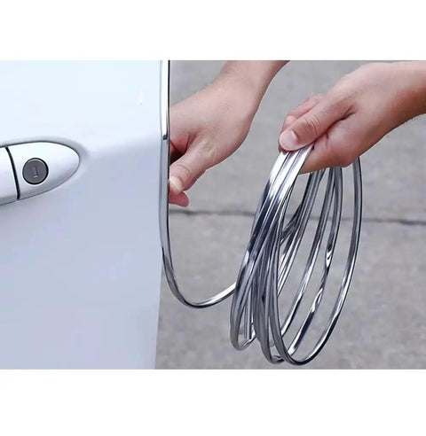 Heavy Duty Car Door Edge Guard Strip For Tesla Cybertruck Exterior Protection in chrome, being installed near door.