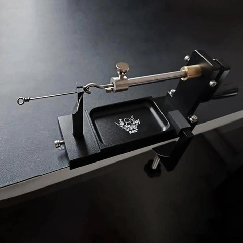 Beefy Fishing Tool Kit With Wire Bender, Loop Maker, Fly Tying Station, And Reel Winder Featuring Drag System in use on a table