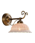 Ceramic Wall Sconce, 9 Inch Brass Vintage Light with floral patterned shade and antique brass arm for elegant bedroom decor.